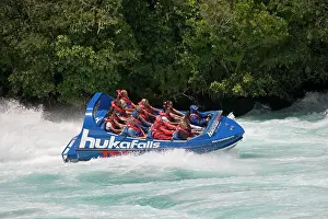 Waikato: Tourists in Huka Falls jet boat Waikato River