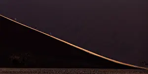 Climb: Tourists like to climb the dunes in Namib desert especially