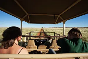 Trucks: Tourists - on safari at the edge of the Namib Desert