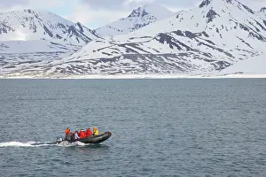 Travelling: Tourists Travelling by Zodiac