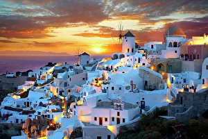 Mills: Townscape with windmills at sunset, Oia, Santorini