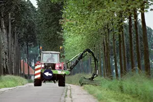 Verge: Tractor - cutting roadside grass verge