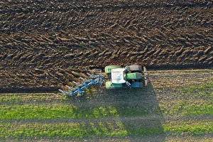 Farmer: Tractor plow
