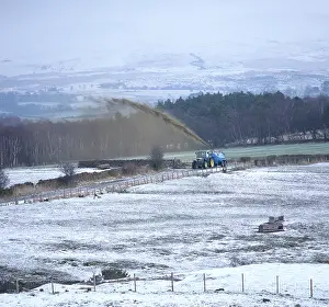Fertilizer: Tractor spraying slurry