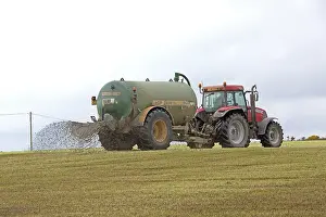 Pembrokeshire: Tractor working with muck spreader Pembrokeshire
