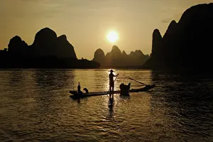 Guilin: Traditional fisherman with cormorants and