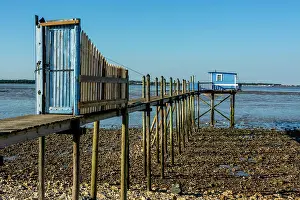 Stilts: Traditional fishing huts on stilts carrelets near