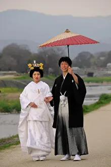 Celebrations: Traditional Japanese wedding couple wearing kimonos