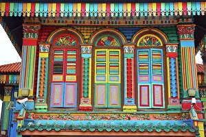 Shutters: Traditional rainbow coloured house with colourful shutters