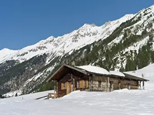 Ache: Traditional wooden mountain hut or Alp in