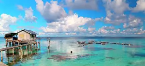 Lifting: transplant with his stilt house and his boat lifting