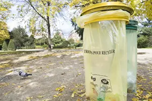 Packaging: Trash for recyclable waste in a square in Paris