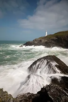 Crashing: Trevose Head crashing waves and lighthouse