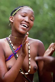 Tradtional: Tribal Dancer - Bushmen Girl dancing in Manghetti dunes