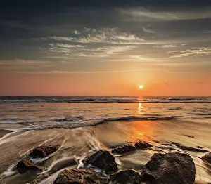Cloudscape: Tropical beach vacation background, waves and ro