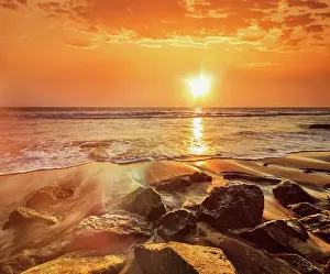 Flare: Tropical beach vacation background, waves and ro
