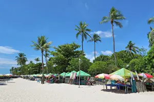 Vacations: Tropical palm tree beach at Hua Hin, Thailand