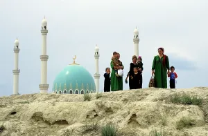 Nomadic: Turkmen women and children in traditional clothes
