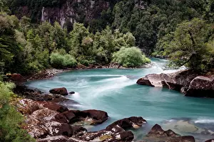 Flows: Turquoise mountain river Futalefu flows through