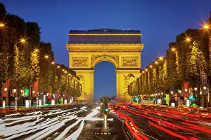 Parisian: Twilight along Champs Elysee with Arc de