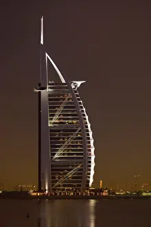 Emirates: UAE, Dubai. Burj al Arab Hotel in evening