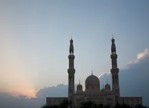 Emirates: UAE, Dubai. Mosque with palm trees in front