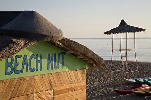 Rental: UAE, Fujairah. Beach Hut sign on hut with