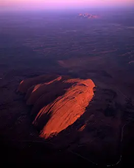 Ayers: Uluru (Ayers Rock) at sunrise, aerial image