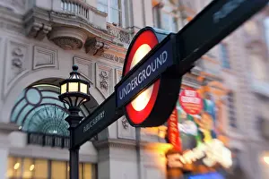 Features: Underground sign, Piccadilly Circus, London, UK