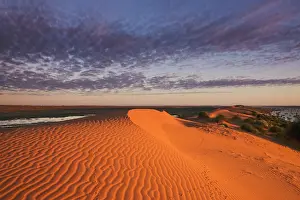 Simpson: Unusual flood water between dunes seen