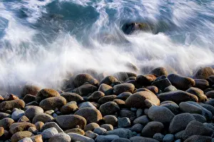 Power: USA, California, Big Sur. Boulders along the shoreline
