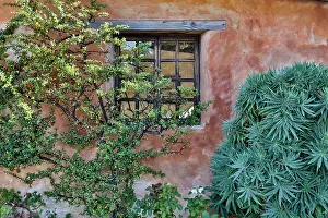 Window: USA, California, Carmel. Inside the grounds at the