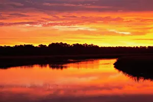 Point: USA, Georgia, Savannah. Sunrise along Grimball Creek