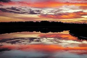 Point: USA, Georgia, Savannah. Sunrise along Grimball Creek
