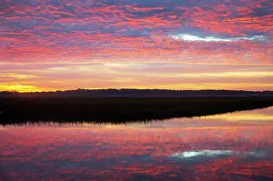 Point: USA, Georgia, Savannah. Sunrise along Grimball Creek
