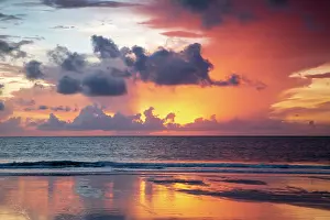 Seascape: USA, Georgia, Tybee Island. Sunrise with reflections