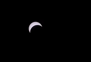 Moon: USA, Indiana, Carmel. Partial solar eclipse. ic Wendy Kavene