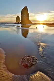 Stack: USA, Oregon. Cannon Beach low tide and ripples in