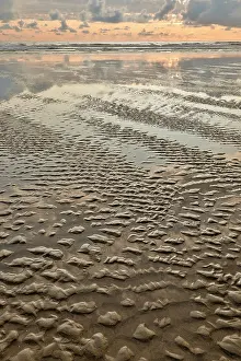 Ripple: USA, Oregon, Cannon Beach. Sunset golden colors