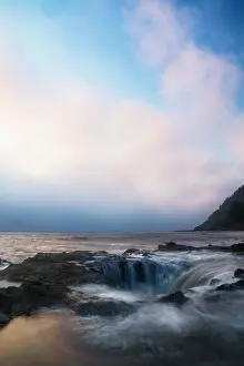 Draining: USA, Oregon, Cape Perpetua and Thor's Well at sunset