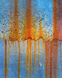 Metal: USA, Oregon, Tillamook. Rust patterns on old farm machinery