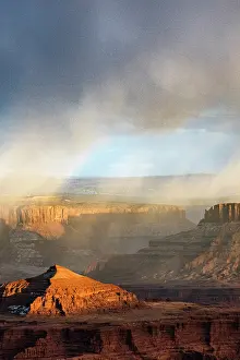Point: USA, Utah. Sunset light breaking through desert