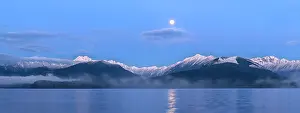 Canal: USA, Washington State, Seabeck. Panoramic of moon
