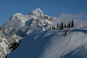 Model: USA, Washington State. Skier challenged by wind-drifted