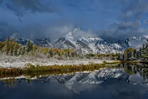 Teton: USA, Wyoming. Fall snow and reflection of Teton