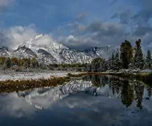 Teton: USA, Wyoming. Fall snow and reflection of Teton