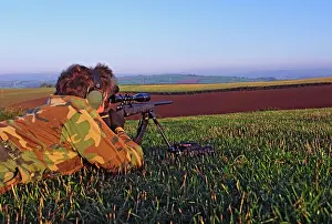 Precision: Varmint hunter takes aim at distant rabbit or fox