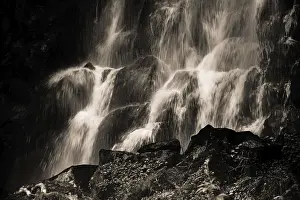 Waterfalls: Vaucoux waterfall cascades gracefully over dark rocks