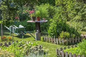Private: Vegetable garden square, wheelbarrow, small table