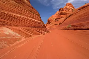 Approximately: Vermillion Cliffs - carved rock made of jurrasic-age